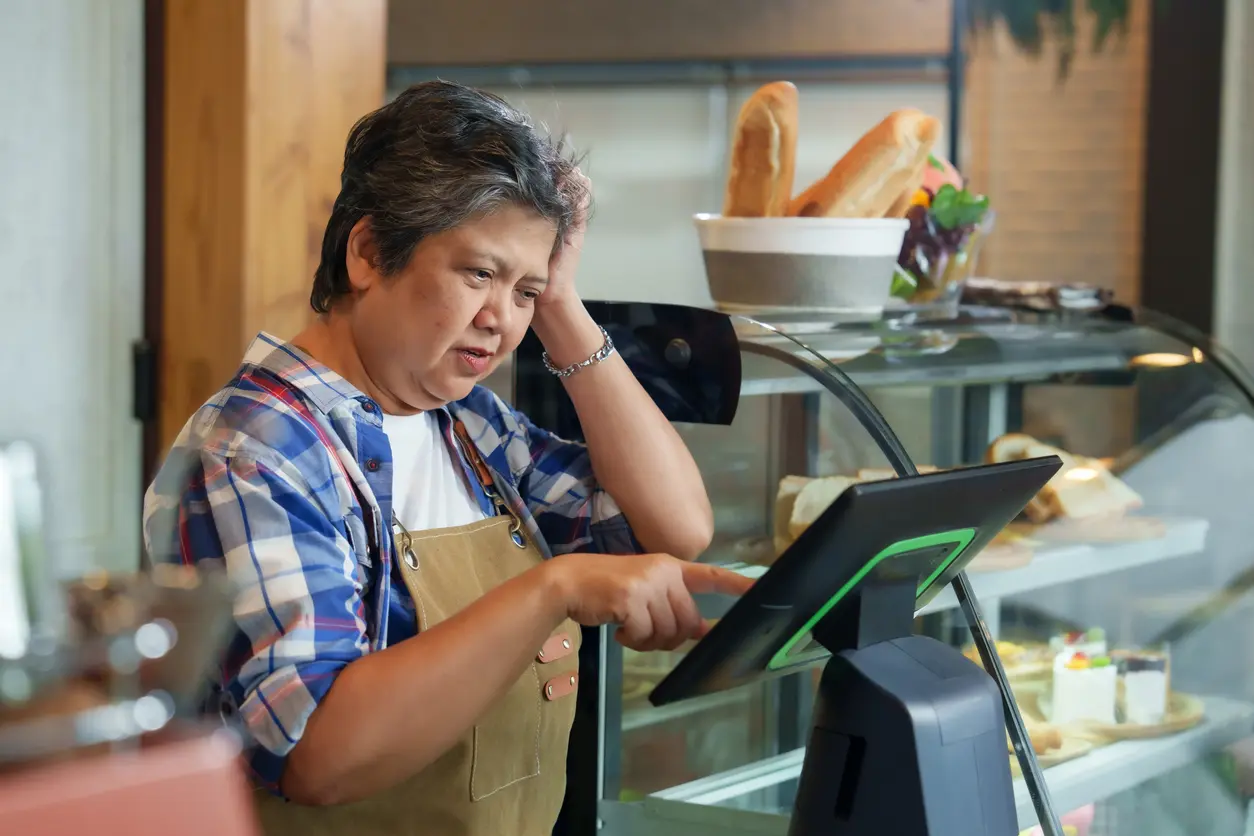 Kitchen staff completing daily checklist